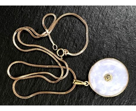 A white jade pendant in yellow metal mount stamped '14k'cwith 9 carat gold chain, weight of chain 4.1gm 