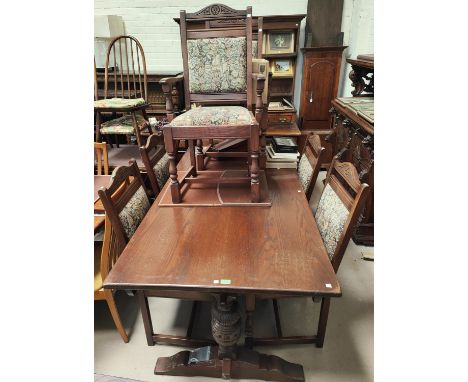 A good quality oak refectory carved pineapple supported dining table, 138x92cm and a set of 6 (4+2) tapestry back oak dining 