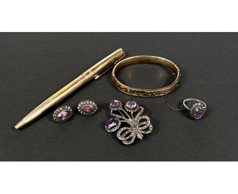 A 1930's marcasite floral brooch, amethyst coloured, with matching ring and earrings; a gold plated bangle; a Parker roller b