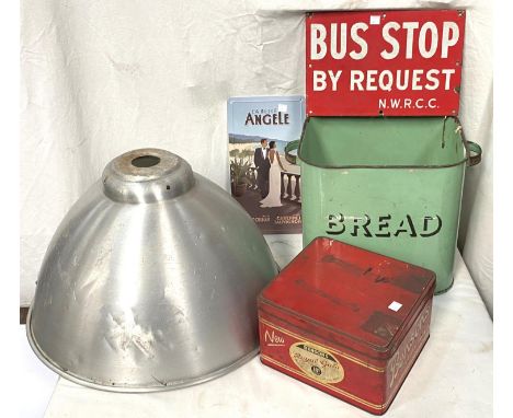 A red &amp; white enamel sign:&nbsp; Bus stop by request; a reproduction enamel sign:&nbsp; La Belle Angele; an enamel breadb