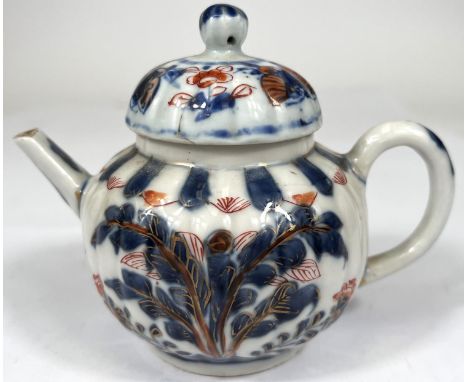 A late 18th/early19th century Chinese small Imari teapot, with gilt highlighted decoration of butterflies and plants, height 