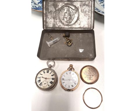 A hallmarked silver key wound pocket watch with open face (glass loose); a gold plated keyless hunter pocket watch, monogramm