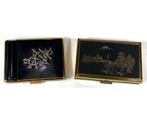 A vintage Kigu of London compact with lipstick case, black enamel with diamante decoration in original box and a Japanese win
