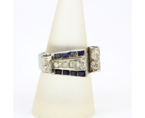 A white metal (tested minimum 9ct gold) ring set with step cut sapphires and old brilliant cut diamonds, ring size R.