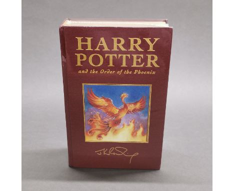 A first edition sealed hardback Harry Potter and the Order of the phoenix novel.