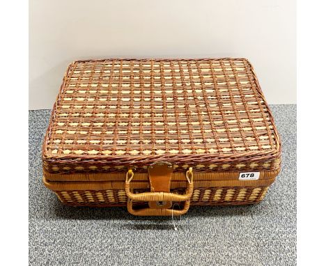 A vintage picnic hamper and original contents.