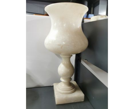 A 1920's polished alabaster table lamp and shade, H. 33cm.