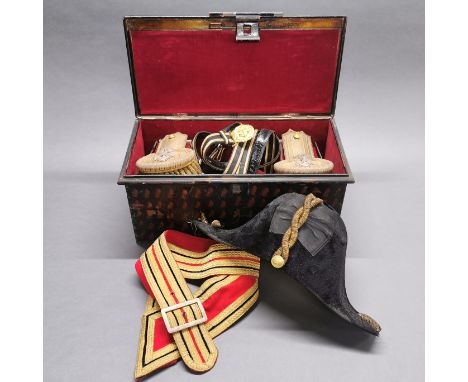 A early 20th century cased Naval bicorn hat, belt, sash and epaulets. Noted on the lid for L. J. Walker L.R.N.