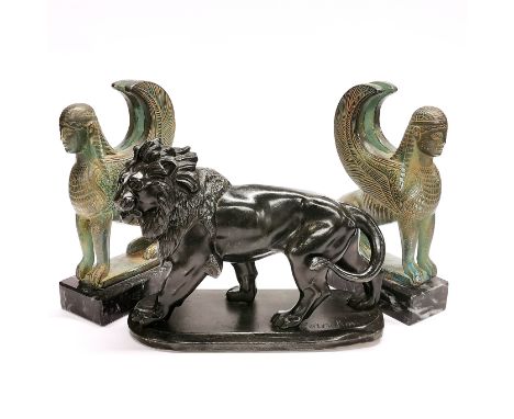 A 19thC French spelter figure of a lion signed Coinchon, L. 22cm, H. 17cm. Together with a pair of glazed ceramic classical f