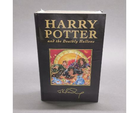 A first edition sealed hardback Harry Potter and the Deathly Hallows novel.