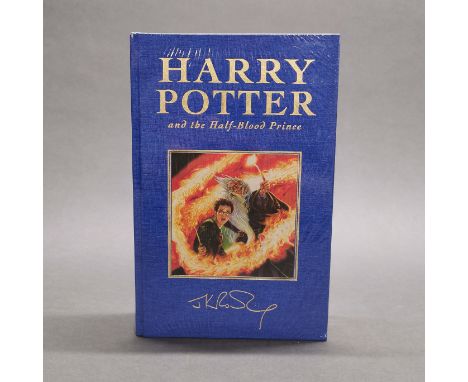 A first edition sealed hardback Harry Potter and the Half blood prince novel.