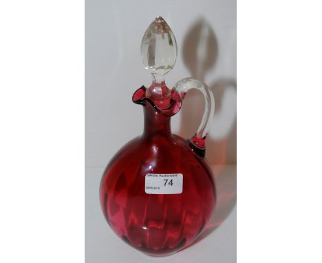Cranberry glass decanter with clear glass handle and stopper 