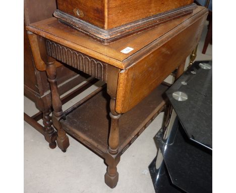 Oak drop leaf table with lower shelf