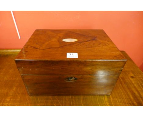 A Victorian rosewood and mother of pearl inlaid fitted vanity box