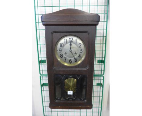 An oak wall clock