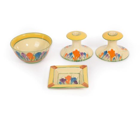A Pair of Clarice Cliff Bizarre Crocus Pattern Candlesticks, printed marks, 8.5cm; An Ashtray, 12cm square; and A Bowl, 14cm 