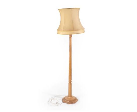 Workshop of Robert Mouseman Thompson (Kilburn): An English Oak Standard Lamp, post 1955, octagonal column and base, with carv