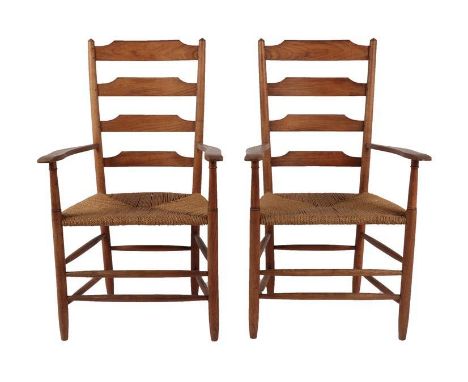 A Pair of Cotswold School Ash Ladderback Armchairs, with rush seats, 105cm (2)  Philip Clissett (1817-1913) a chair maker tau