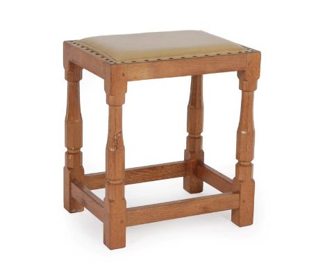 Squirrelman: A Wilfrid Hutchinson (Husthwaite) English Oak Dressing Table Stool, on four octagonal legs joined by stretchers,