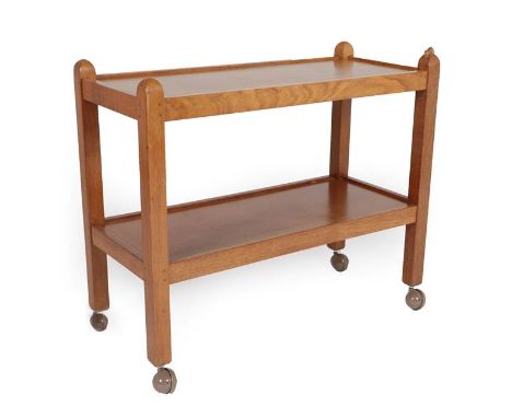 Workshop of Robert Mouseman Thompson (Kilburn): An English Oak Tea Trolley/Dinner Wagon, with two tiers both with raised side