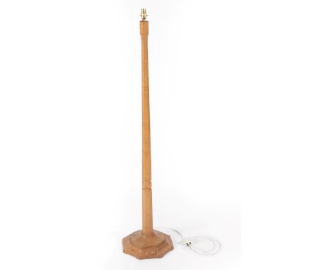 Workshop of Robert Mouseman Thompson (Kilburn): An English Oak Standard Lamp, post 1955, octagonal column and base, with carv