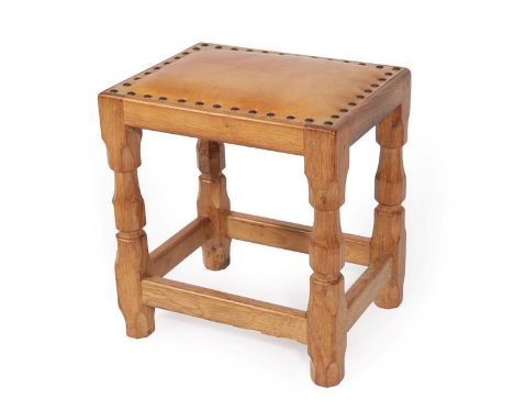 A Sid Pollard (Thirsk) English Oak Stool, with nailed hide seat, on four octagonal legs joined together by four low level rai