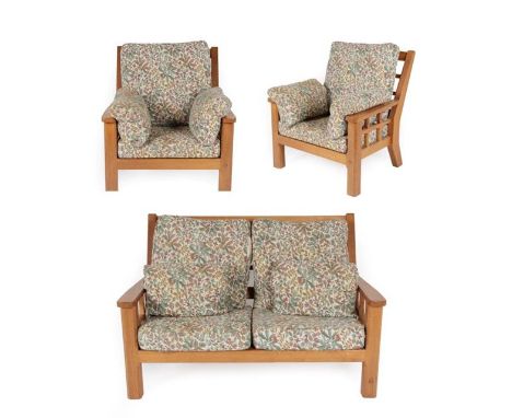 Knightman Family: An Old Mill Furniture (Balk) English Oak Three Piece Suite, comprising Two-Seater Sofa, with lattice back a