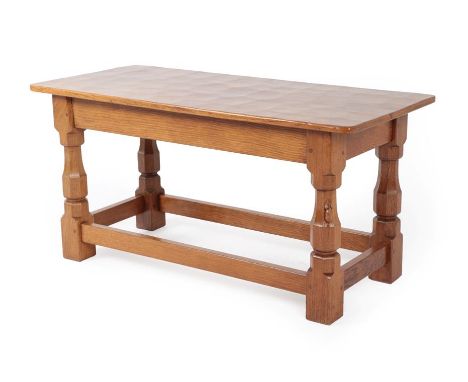 Workshop of Robert Mouseman Thompson (Kilburn): An English Oak Double Dish Top Stool, post 1970, with nailed and adzed top on