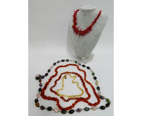 Two amber bead necklaces and a strand of vintage red branch coral, coloured agate bead necklace and a faceted strand of beads
