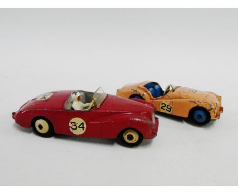 Two vintage Dinky toy cars to include Triumph TR2 and a Sunbeam Alpine, (2) 