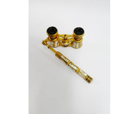 A pair of French mother of pearl and gilt metal opera glasses 