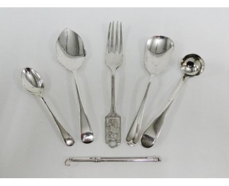 A mixed lot to include four silver teaspoons, a silver fork and a silver swizzle stick, all with mixed hallmarks and makers (