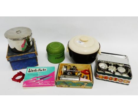 Collection of vintage kitchenalia to include a Bakelite napkin ring, pastry cutting enamel tin and contents, a miniature stov