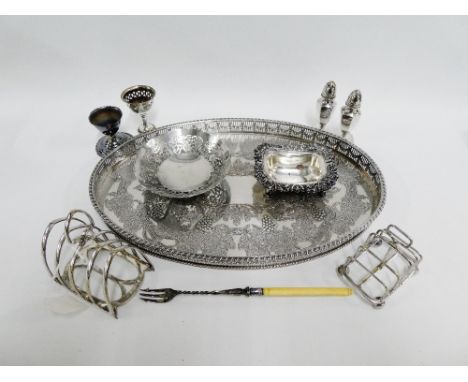 A collection of Epns wares to include two toastracks, tray, pickle fork, bonbon dish and egg cups, etc (a lot) 