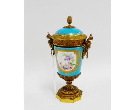 19th century French porcelain ormolu mounted vase with mask head handles and acorn finial to the domed cover, painted with fi