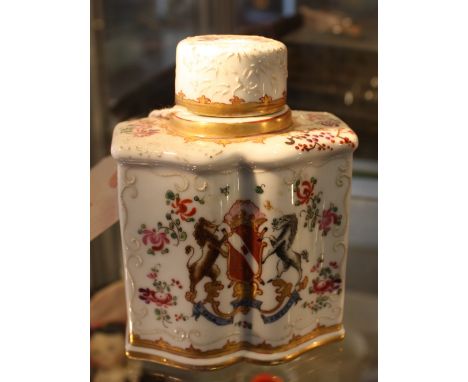 A French porcelain tea caddy armorial and floral hand-painted with motto Sola Virtus Invicta, French marks to base. H. 12cm.