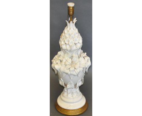 A large blanc de chine table lamp, of urn form with foliate decoration, H. 75cm.