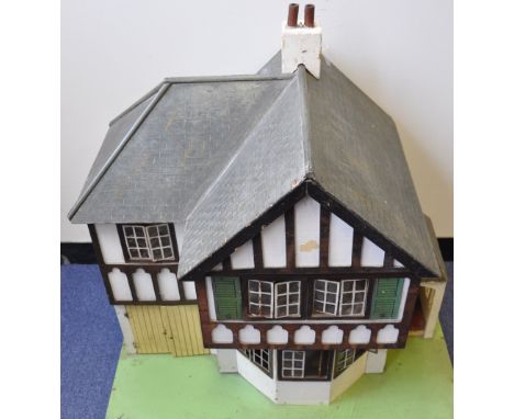 A inter-war period doll's house circa 1932-36, Lines Bros./Tri-ang, No. 71 (Half Stockbroker), the mock Tudor building with a