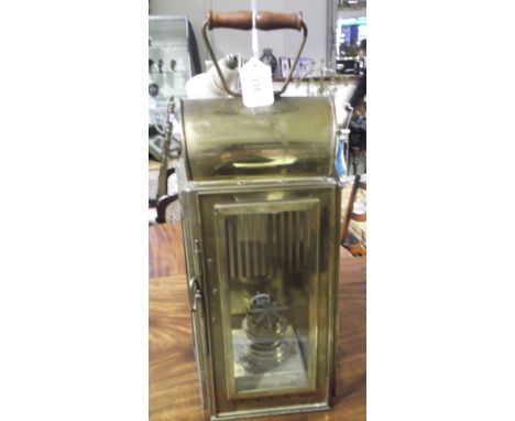 An early 20th Century brass carriage oil lamp with star cut glass panels now converted to electricity. H. 50cm.