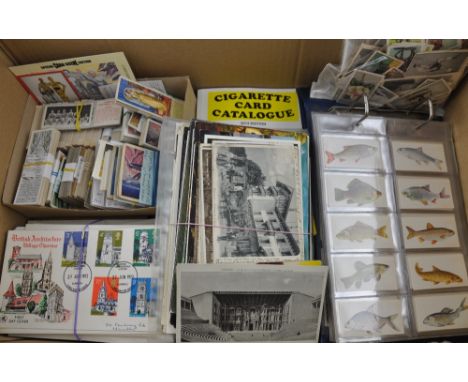A large quantity of cigarette cards and trade cards in sets, album and loose with two card catalogues, also 65 postcards and 
