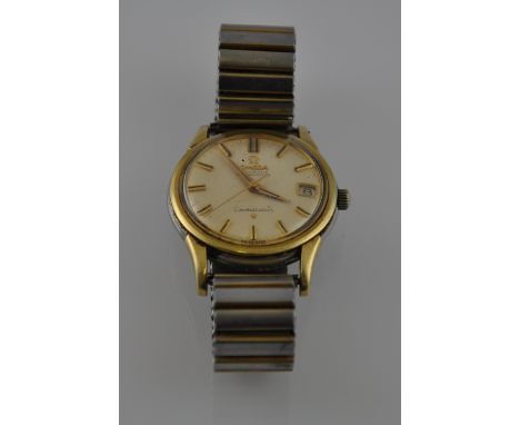 An Omega Constellation gentlemen's automatic chronometer, with screw-back, the cream dial with baton numerals and date apertu