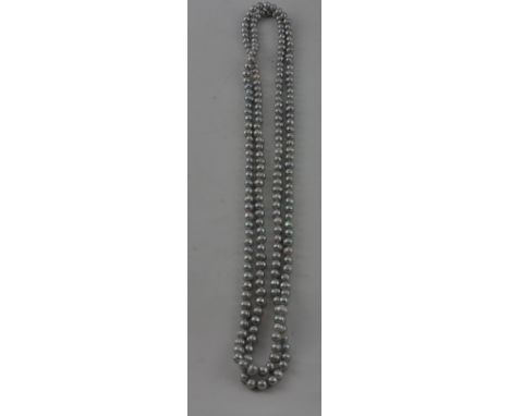 An opera length string of light grey baroque freshwater pearls, L. 158cm.