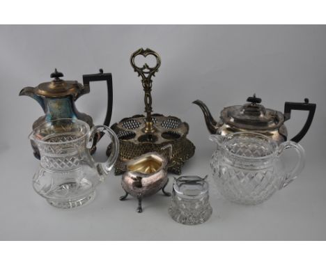 A silver-plated tea service by Walker & Hall, comprising teapot, coffee pot and milk jug; together with a cruet frame, two cu