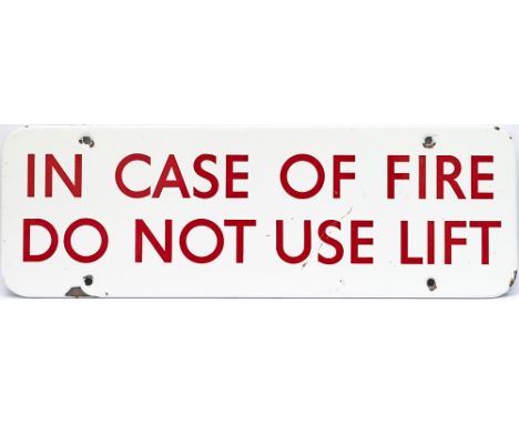 BR FF enamel doorplate IN CASE OF FIRE DO NOT USE THE LIFT. In very good condition with a few minor face chips, measures 18in
