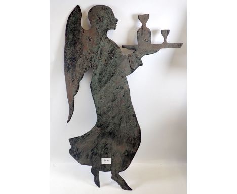 A vintage riveted iron wall plaque decorated angel with tray, 74cm tall
