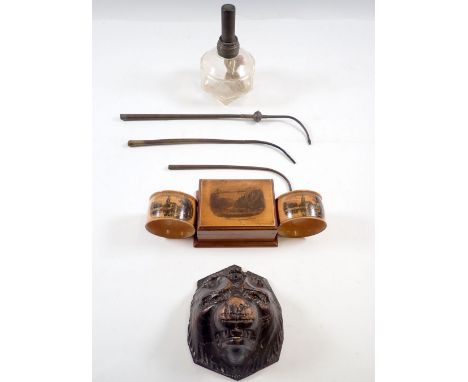 A jewellery makers lamp, a mauchline ware box and two napkin rings plus carved lion mask