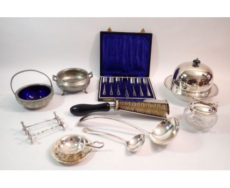 A group of silver plated items including muffin dish, cake forks, ladle and pewter