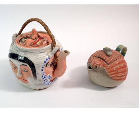 A Japanese Bankoware five faces teapot, repair to spout and a Bankoware quail teapot, crack to lid