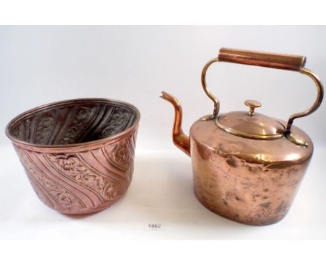 An Art Nouveau copper planter embossed flowers, 16cm and a copper kettle