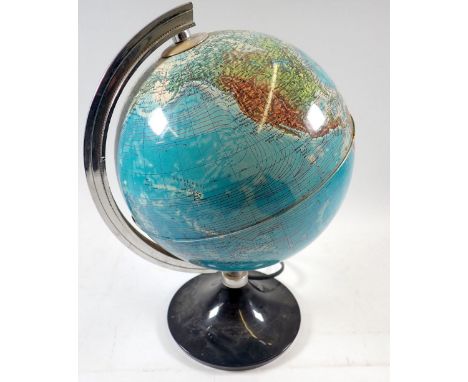 A vintage metal printed globe 
